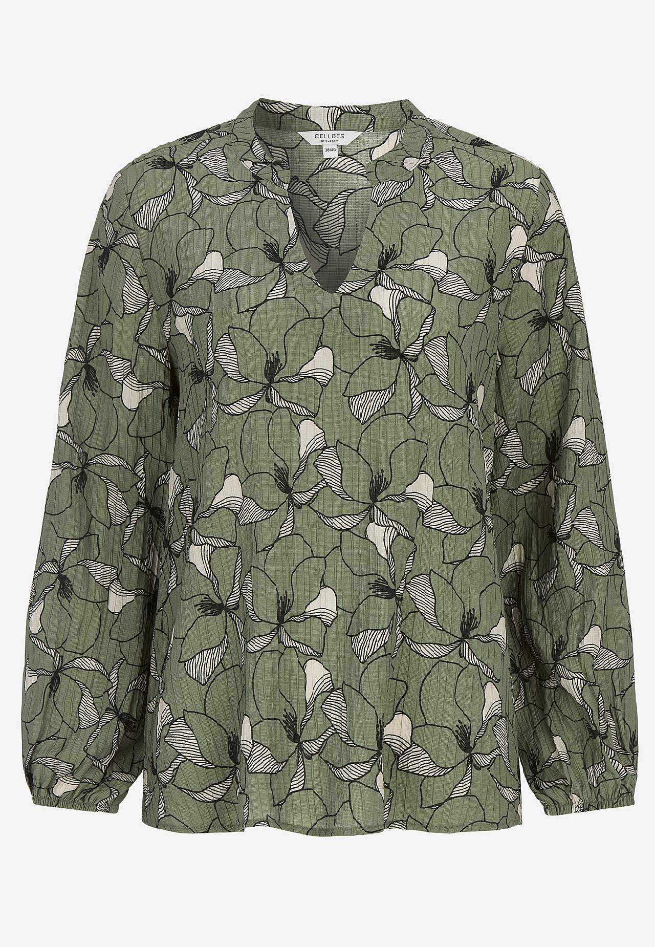 Kukkakuvioinen pusero sommitelmalla