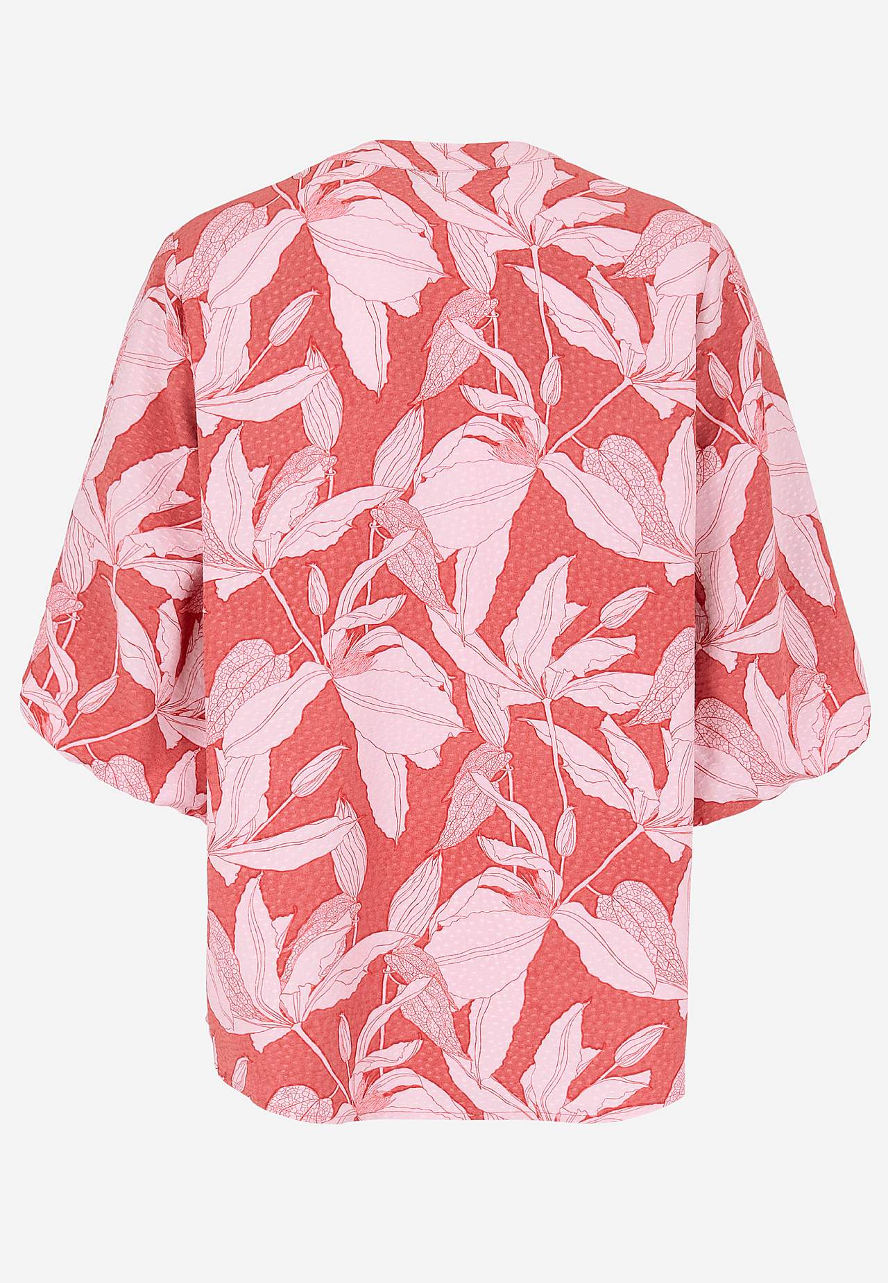 Kudottu pusero puhvihihoilla