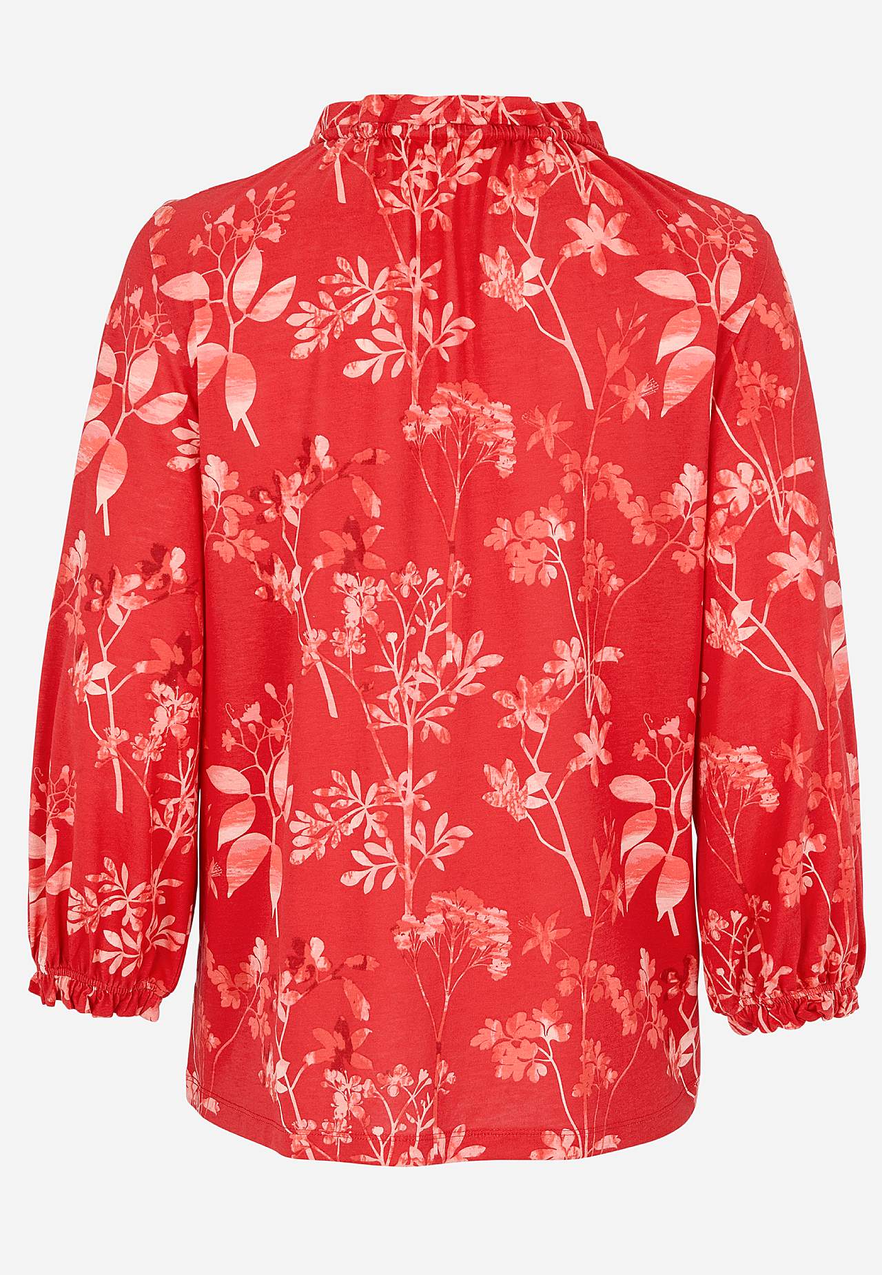 Kuvioitu trikootoppi röyhelöreunalla