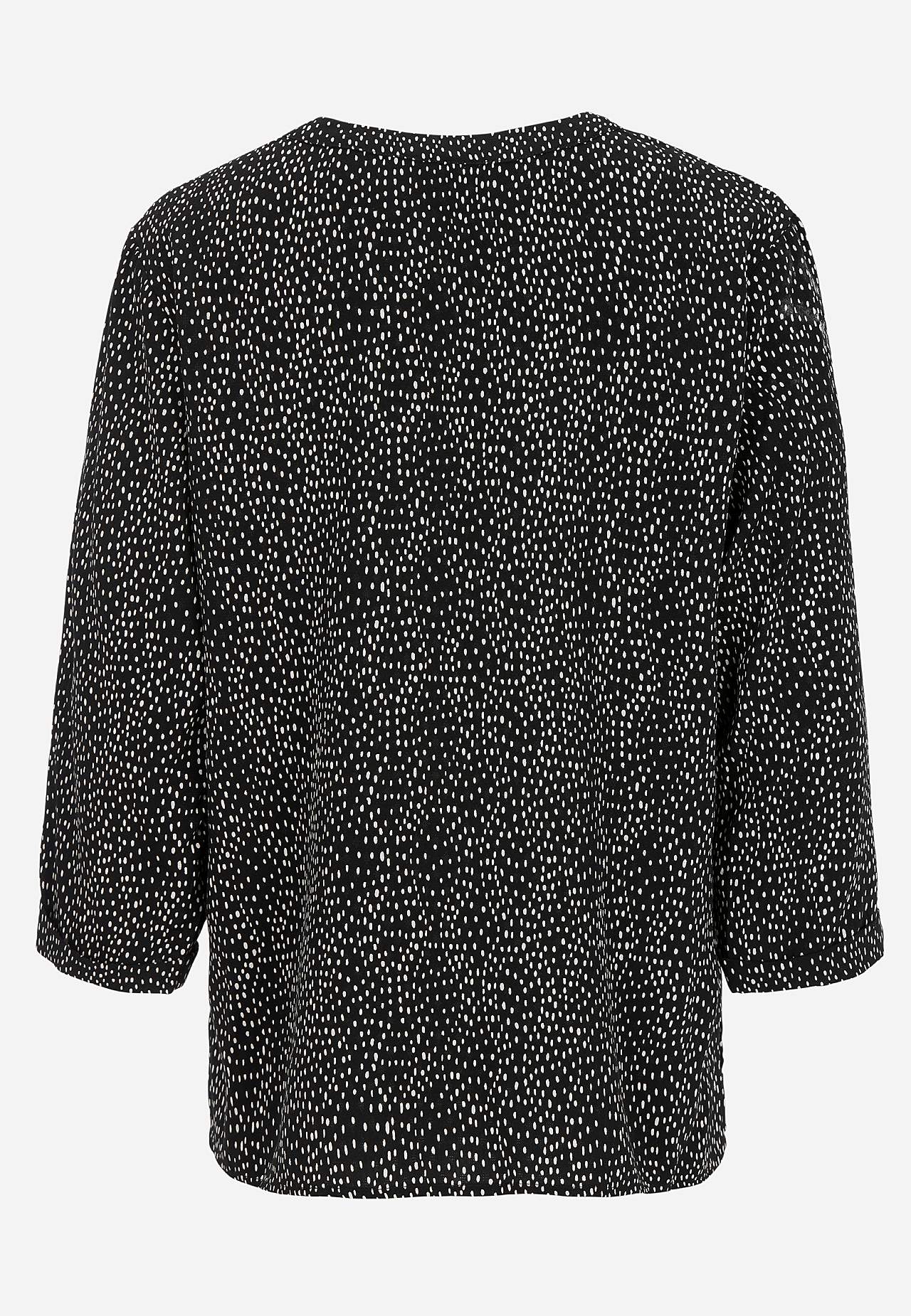 Jacquard-neuloksinen pusero