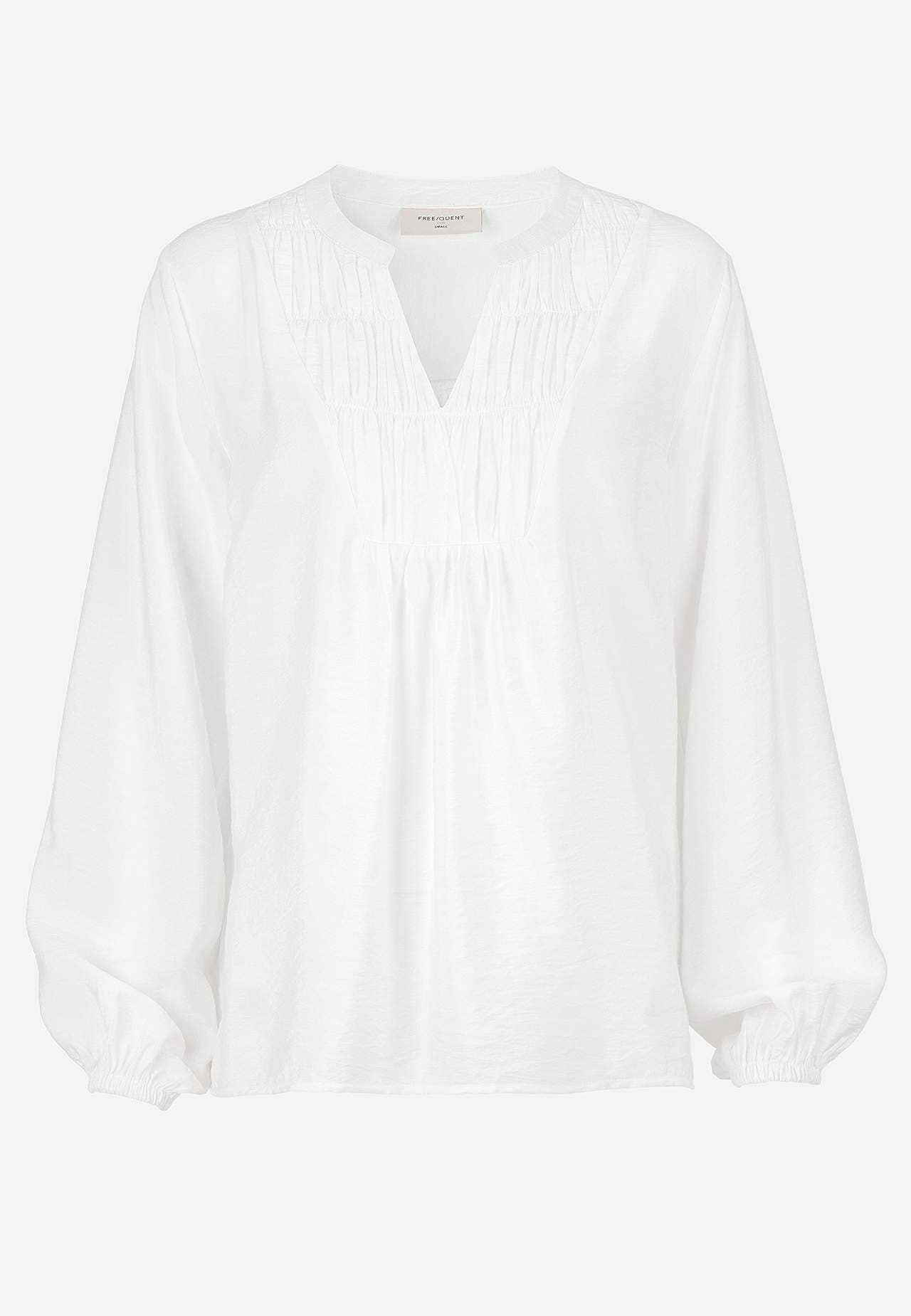 Kudottu pusero laskoksilla