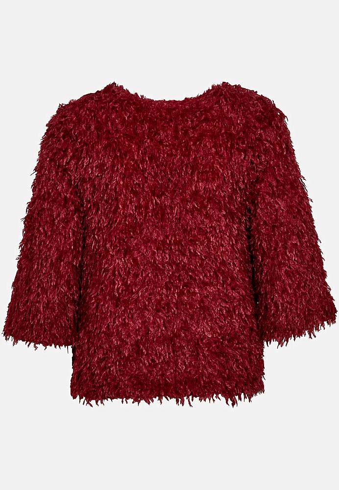 Juhlatoppi höyhenenkaltaisella materiaalilla