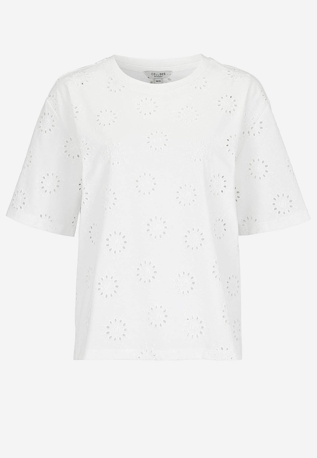 Trikootoppi kirjaillulla rei’ityksellä