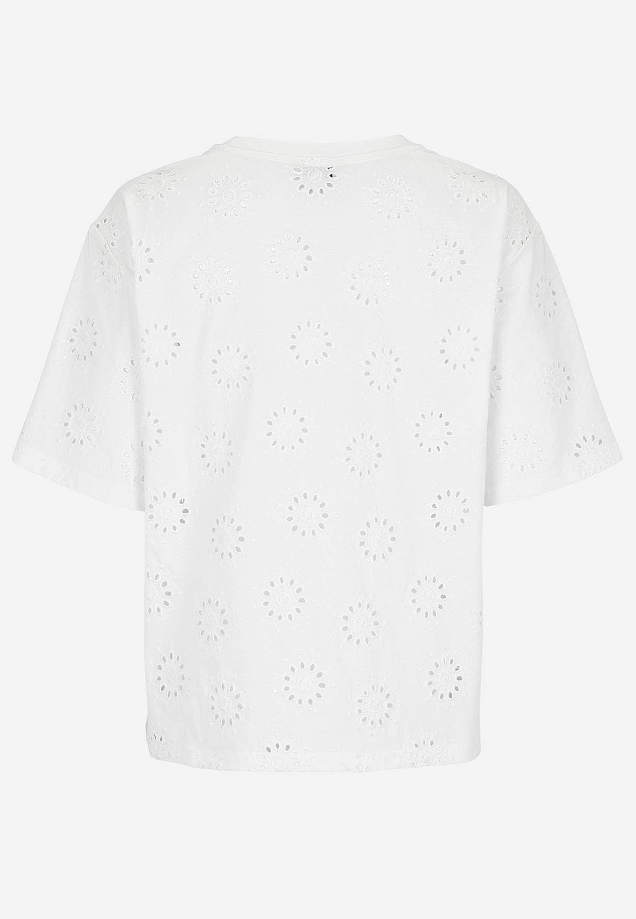 Trikootoppi kirjaillulla rei’ityksellä