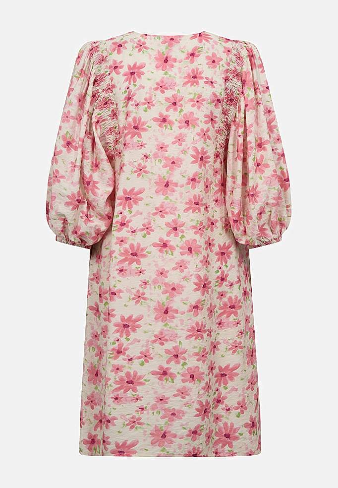 Kukallinen, kudottu mekko taskuilla ja smokkidetaljilla